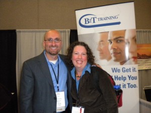 Laura and Kupe at the B2TTraining booth